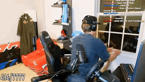 Man Wearing Headphones Sitting By Window GIF