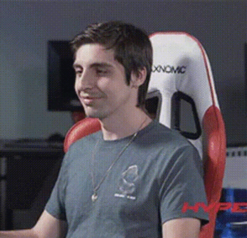 Man Wearing Headphones Sitting On Couch GIF