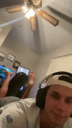 Man Wearing Headphones Taking Selfie