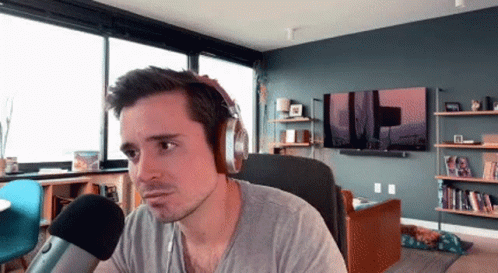Man Wearing Headphones Talking Into Microphone GIF