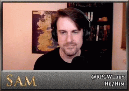 Man Wearing Headphones Talking Into Microphone With Sam