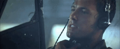 Man Wearing Headphones Talking On Phone GIF