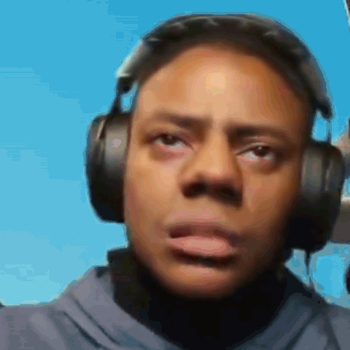 Man Wearing Headphones Tongue Out GIF