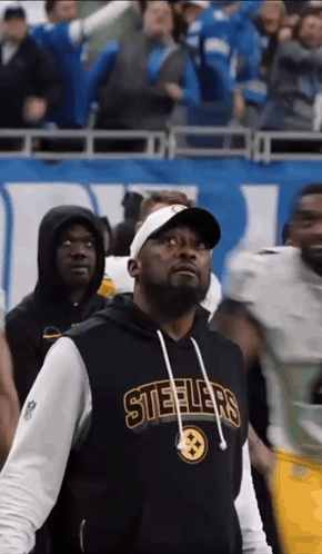 Man Wearing Headphones Watching Steelers vs Bengals
