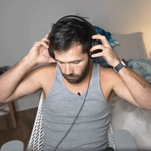 Man Wearing Headphones with Arm Tattoo