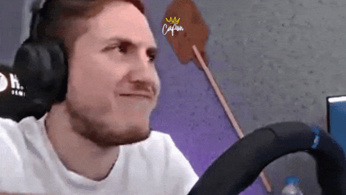 Man Wearing Headphones With Crown