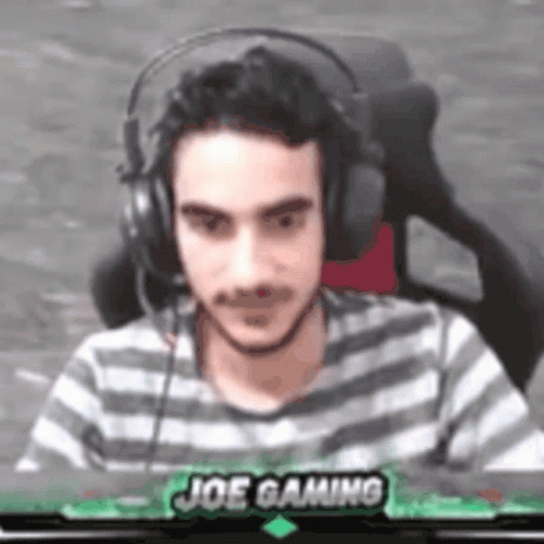 Man Wearing Headphones With Joe Gaming on Bottom
