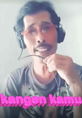 Man Wearing Headphones With Kangen Kamu In Pink Letters GIF