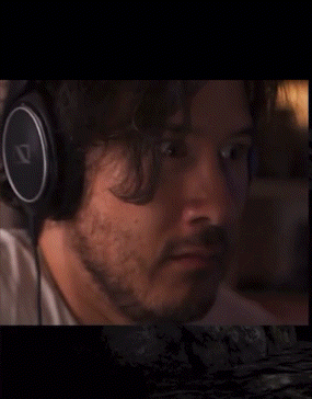 Man Wearing Headphones With Letter K