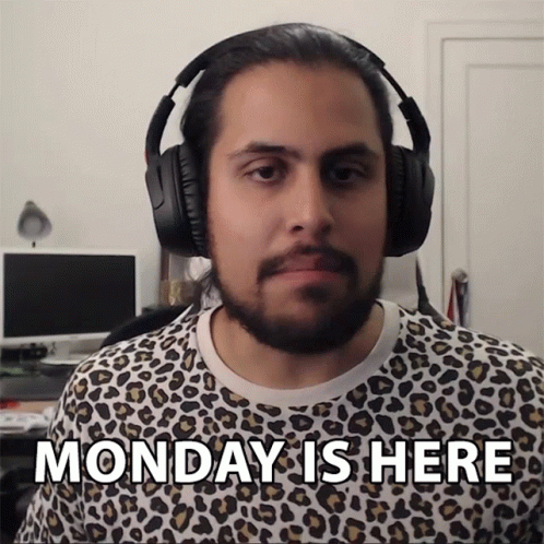 Man Wearing Headphones with Monday Is Here