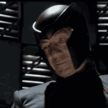 Man Wearing Helmet Looking At Camera GIF