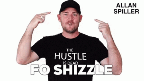 Man Wearing Hustle Is Dead Shirt