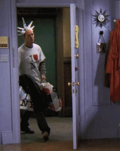 Man Wearing I Love NY Shirt in Doorway