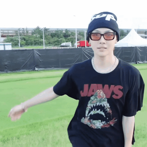 Man Wearing Jaws T-Shirt and Beanie
