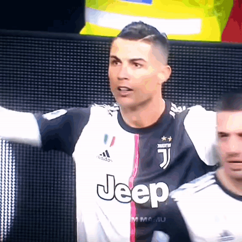 Man Wearing Jeep Jersey in Crowd