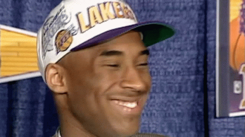 Man Wearing Lakers Hat Smiling