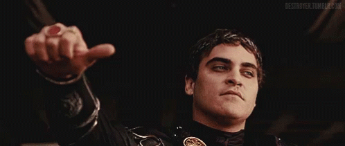 Man Wearing Laurel Wreath Giving Thumbs Up