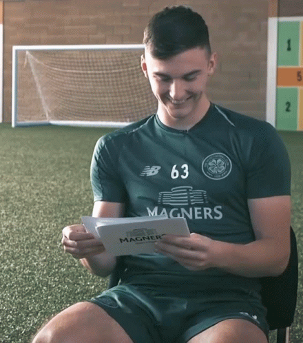 Man Wearing Magners Shirt Reading Book GIF