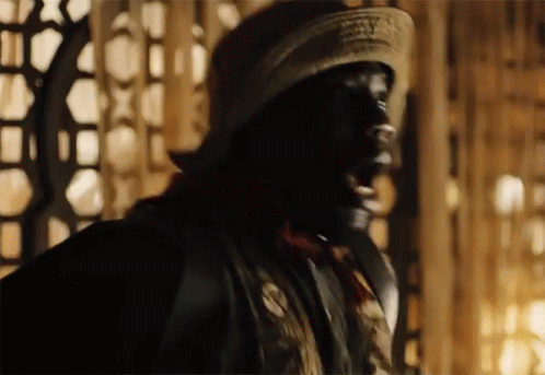 Man Wearing Mask In Darkness GIF
