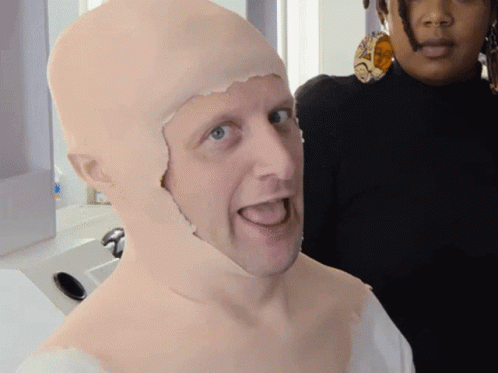 Man Wearing Mask With Tongue Out