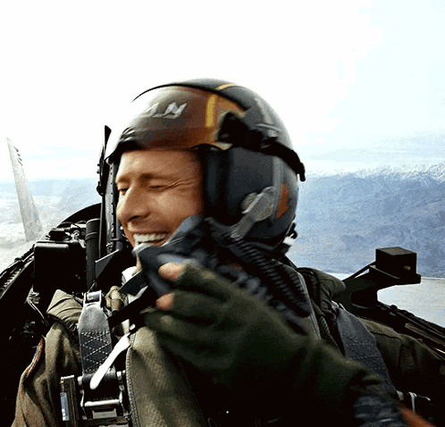 Man Wearing Navy Helmet Smiling