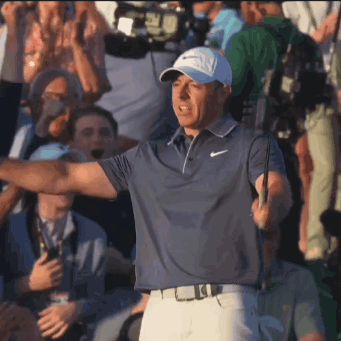 Man Wearing Nike Hat Holding Golf Club