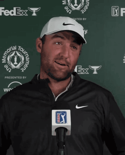 Man Wearing Nike Hat In Front Of FedEx GIF