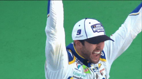 Man Wearing Number 9 Hat Raising Arms