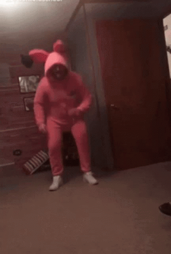 Man Wearing Pink Bunny Costume Hopping GIF