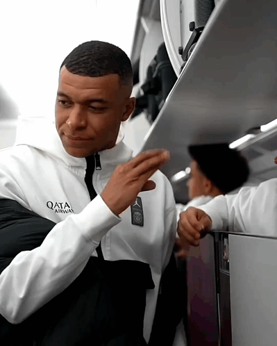 Man Wearing Qatar Airways Jacket