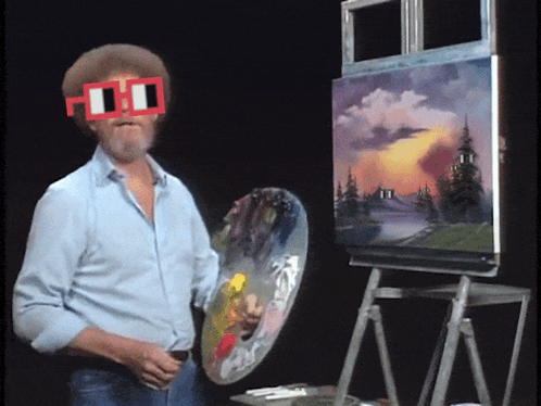 Man Wearing Red and White Glasses Holding Palette