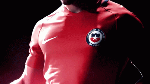 Man Wearing Red Chile Football Federation Shirt