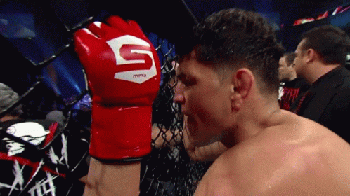 Man Wearing Red MMA Glove