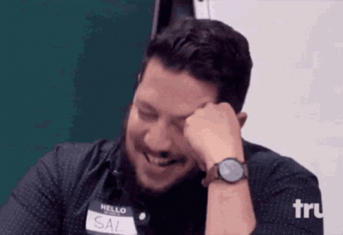 Man Wearing Sal Name Tag