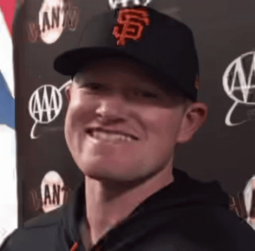 Man Wearing San Francisco Giants Hat Smiling