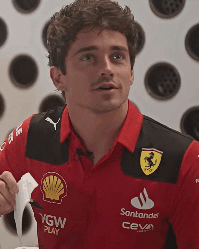Man Wearing Santander Shirt