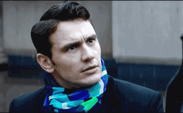 Man Wearing Scarf Looking Left GIF