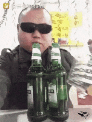 Man Wearing Shades Chugging Beer GIF