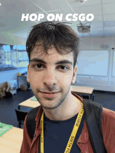 Man Wearing Sixth Form Lanyard Smiling