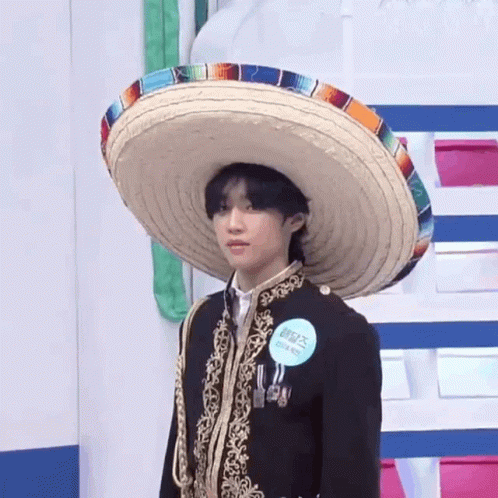 Man Wearing Sombrero and Badge