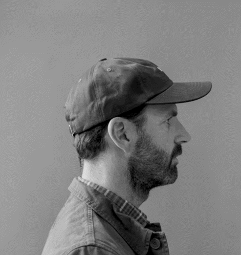 Man Wearing Stacked Hat