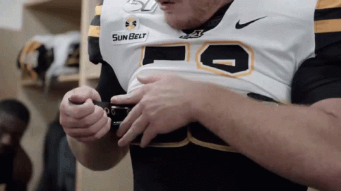 Man Wearing Sun Belt Jersey