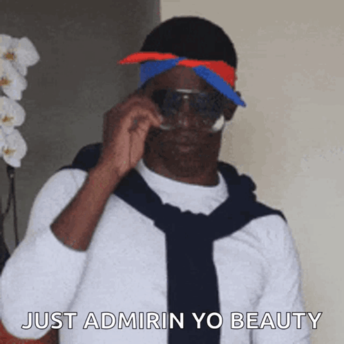Man Wearing Sunglasses And Bandana Saying Admiring Your Beauty GIF