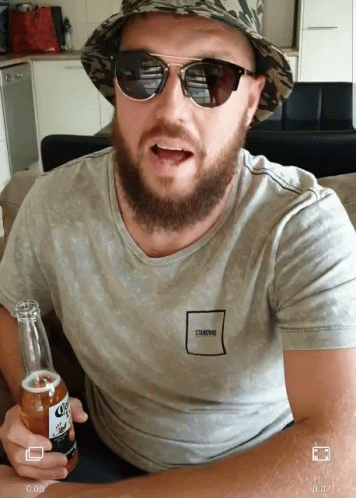 Man Wearing Sunglasses And Hat Holding Corona Beer GIF