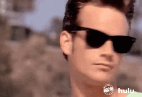 Man Wearing Sunglasses and Hulu Logo