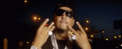 Man Wearing Sunglasses and Necklace
