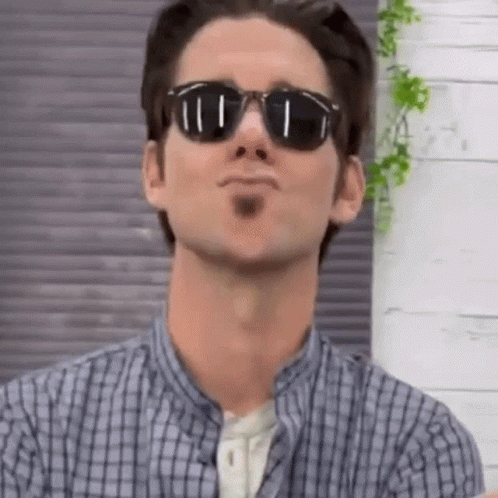 Man Wearing Sunglasses and Plaid Shirt