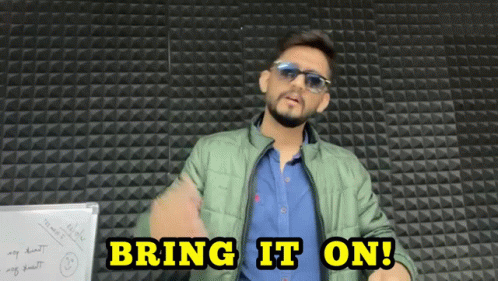 Man Wearing Sunglasses In Front Of Bring It On Wall GIF