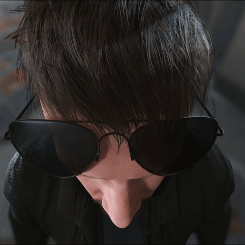 Man Wearing Sunglasses Looking Down GIF