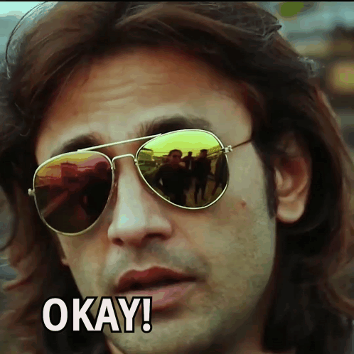 Man Wearing Sunglasses Saying Okay